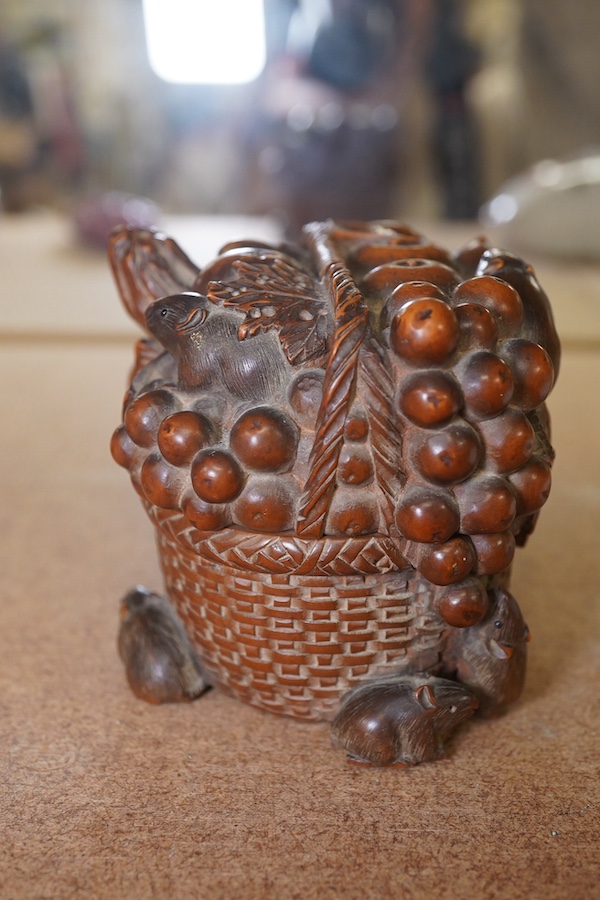 A Japanese boxwood koro and cover, Meiji period, modelled as a basket of fruit with mice, signed to the base, 9cm wide. Condition - fair to good, some chipping